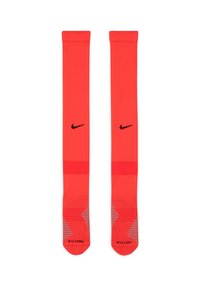 Calze rosse Nike con logo nero e accenti grigi a righe. Design lungo con soletta imbottita e tallone rinforzato. Marcate per piede sinistro e destro.