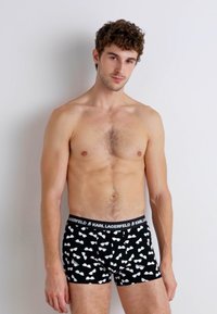 Fekete boxeralsó fehér napszemüveg mintával, rugalmas derékpánttal a "KARL LAGERFELD" logóval, pamutszövetből, testhezálló kialakítással.