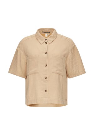 Short-sleeve, cropped shirt in light beige fabric. Features a button-down front, two chest pockets, and a classic collar. Subtle texture.