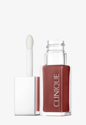 Clinique lip color in transparent rectangular bottle, matte mauve shade, with white doe-foot applicator and silver accents.