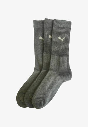 Three pairs of grey Puma crew socks with ribbed cuffs and white Puma logo on each sock.
