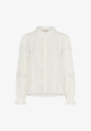 Cremefarbene langärmelige Bluse mit Spitzeneinsätzen, Knopfleiste, spitzem Kragen und Rüschenmanschetten.