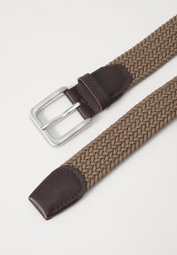 Woven brown belt with a textured pattern, finished with a dark brown leather tip and a silver rectangular metal buckle.