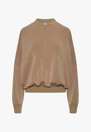 Beżowy pulower z długim rękawem, z zapinanym na półzamek przodem, lekko marszczonym elastycznym dołem, żeberkowymi mankietami i krótkim stójkowym kołnierzykiem.