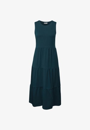 Mouwloze, gelaagde jurk van donkergroen stof. Zachte, gladde textuur met een ronde halslijn en een vloeiende silhoutet.
