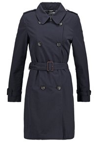 Trench-coat bleu marine croisé avec ceinture, poignets boutonnés et épaulettes, longueur genoux avec col classique.