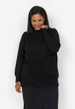 Schwarzer Strickpullover mit geripptem Saum, versehen mit verstreuten silbernen Funkeln. Lässige Passform, lange Ärmel und weicher Stoff.