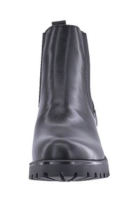 Stivaletti neri in pelle con una texture liscia, pannelli laterali elasticizzati e una suola in gomma robusta dotata di scanalature per la trazione.
