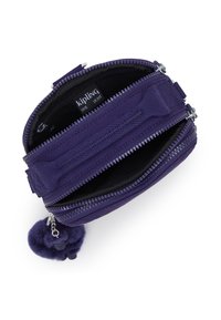 Small purple zippered Kipling pouch with two main compartments and a fuzzy keychain attached.
