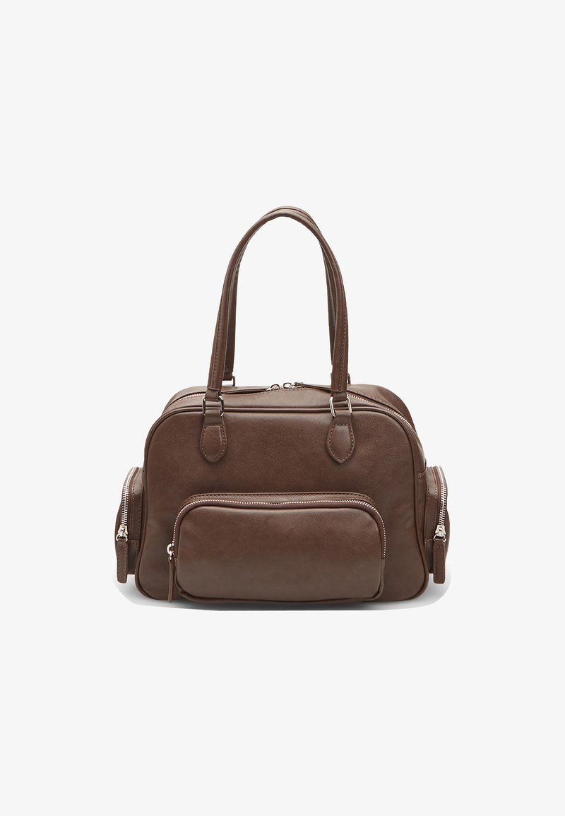 Brown leather handbag featuring two top handles, a main zip compartment, and a front zip pocket. Smooth texture with minimal hardware.