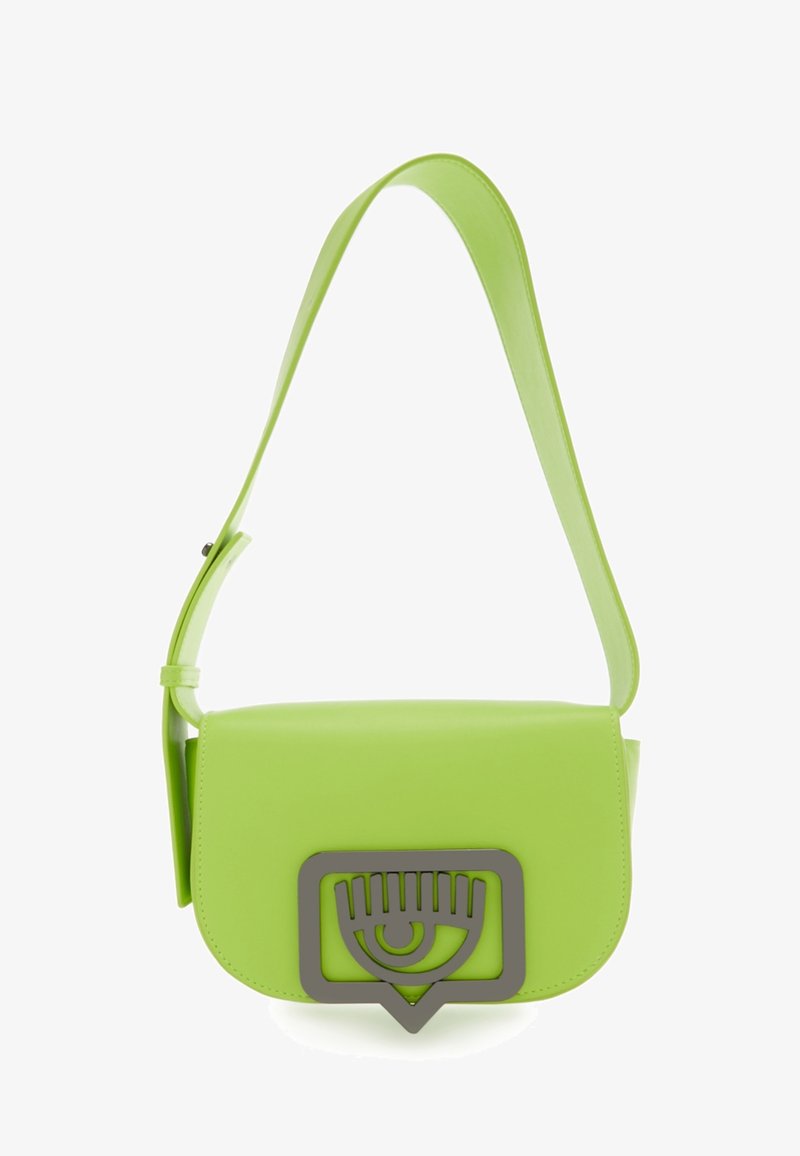 Green leather crossbody bag with a flat shape, featuring a large gray eye motif on the front and a thin adjustable strap.
