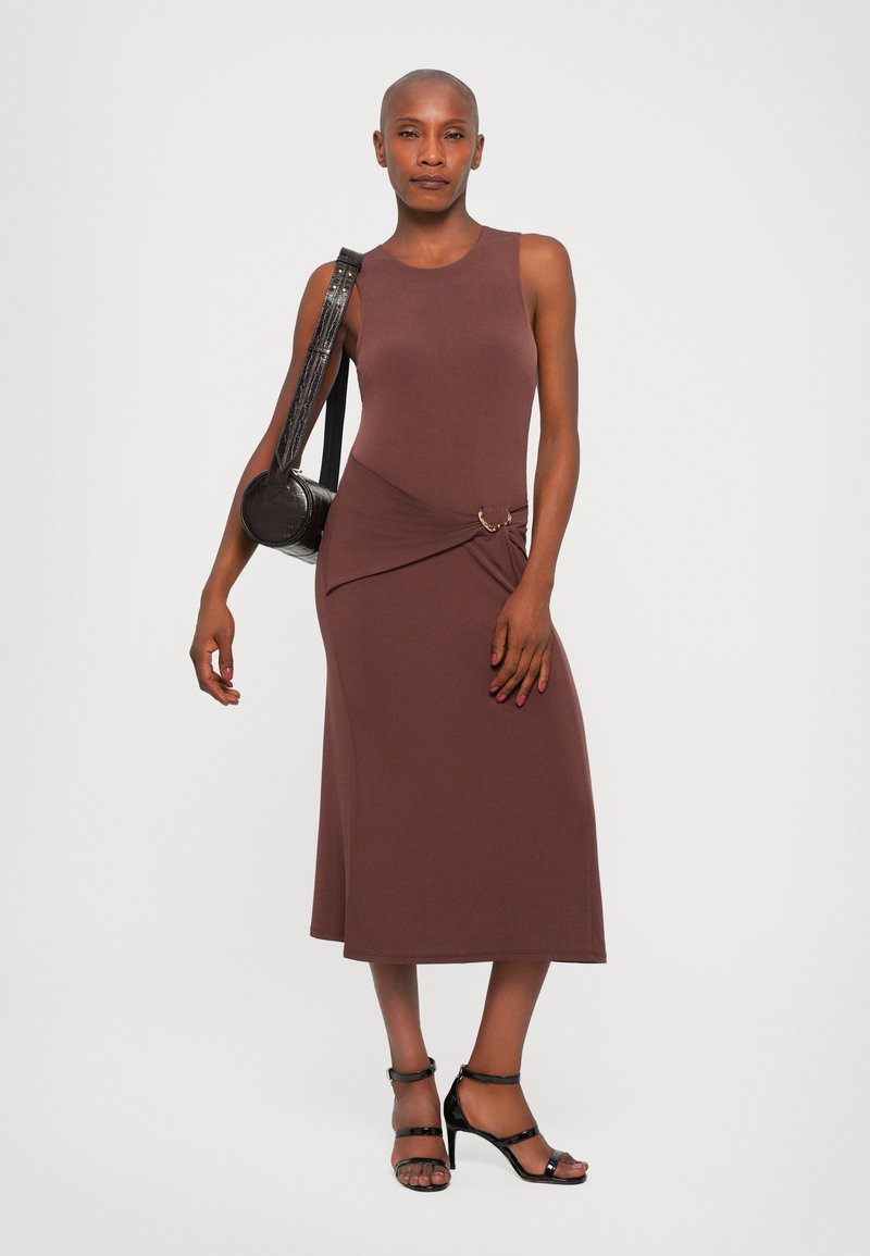 herve leger brown dress The Rachel Crafted from a stretch rib fabric that hugs and smooths your curves Herve Leger Brown Knit Asymmetrical