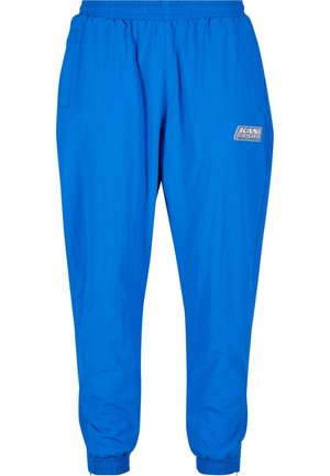 Blue athletic pants made of lightweight material, featuring an elastic waistband, side pockets, and elastic cuffs at the ankles.