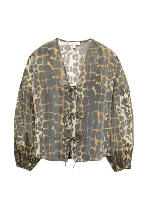 Lätt, mönstrad blus i grått och beige med V-ringning, puffärmar och knytning framtill. Har en djurtrycksdesign.