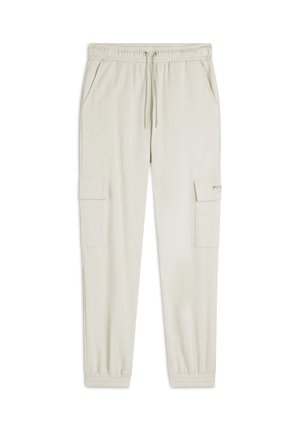 Pantaloni cargo beige chiaro con vita elastica, cordoncino e due tasche laterali. Gamba affusolata con fascette elastiche e dettaglio logo discreto.