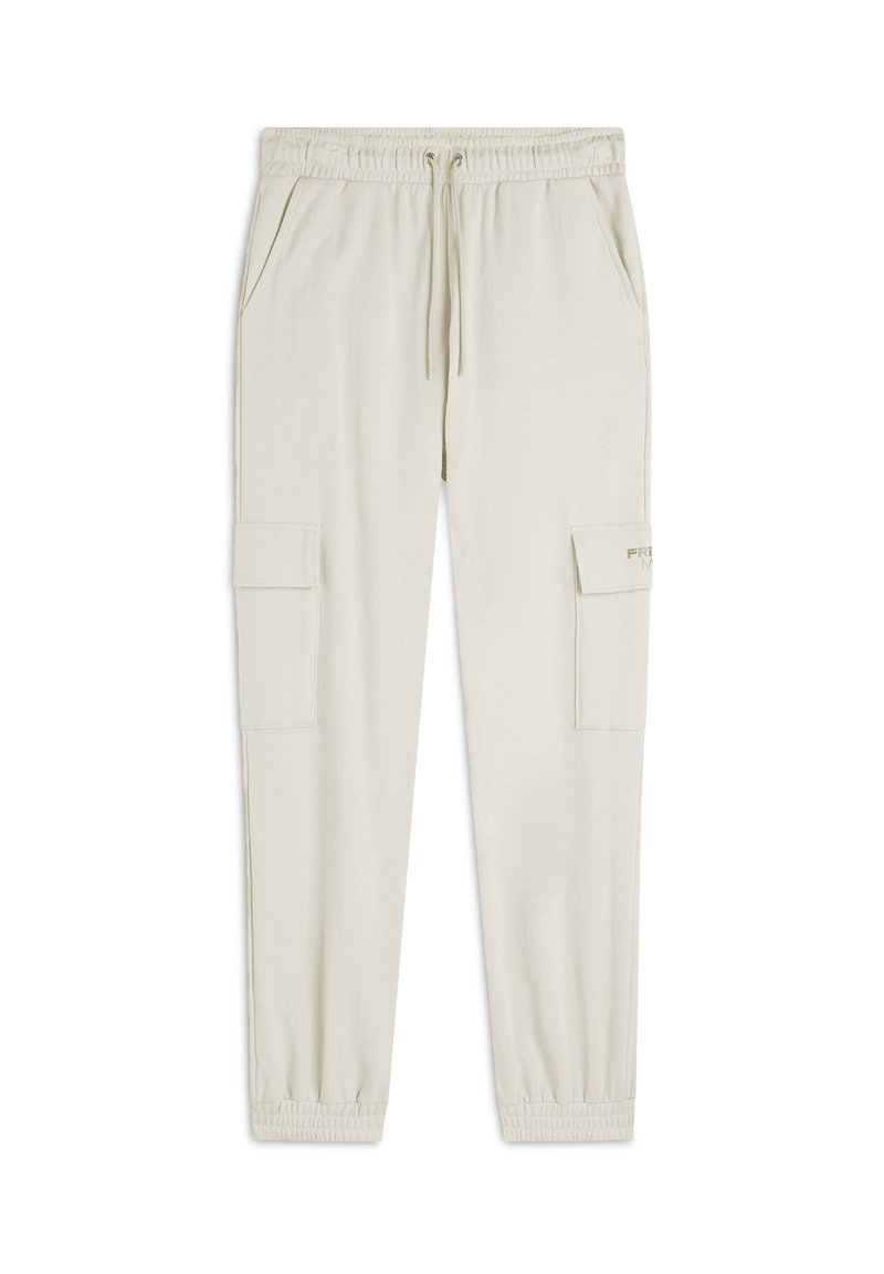 Pantaloni cargo beige chiaro con vita elastica, cordoncino e due tasche laterali. Gamba affusolata con fascette elastiche e dettaglio logo discreto.