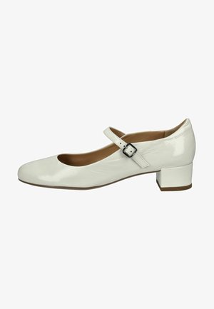 Zapato Mary Jane de charol blanco con punta redonda, tacón cuadrado plano y una correa ajustable con detalle de hebilla plateada.