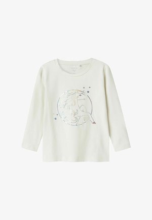 Camisa de algodón blanca de manga larga con un gráfico de unicornio holográfico en un diseño circular, acentuado por pequeñas estrellas.