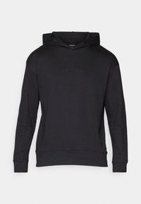 Čierna mikina s kapucňou a voľným strihom. Hladká tkanina, dlhé rukávy a predná vrecko. Obsahuje embosované logo Calvin Klein.