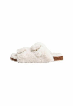 White fuzzy slipper with two rounded plush accents and a cork sole, featuring a soft texture and a simple, open-toe design.