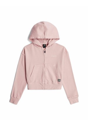 Sweat à capuche zippé rose clair avec poches avant, manches longues et petit logo sur la poitrine et près de l'ourlet.