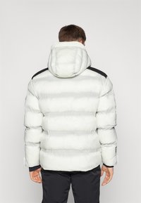 EA7 Emporio Armani CORTINA JACKET - Lyžiarska bunda - glowdark white