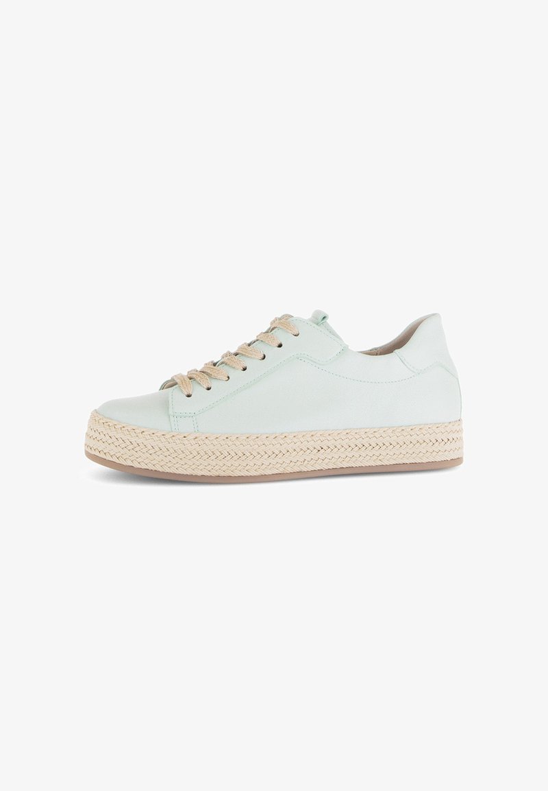 Light green leather sneaker with a textured jute platform sole, featuring beige laces and subtle stitching details, providing a casual look.