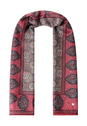 Foulard en soie rouge et marron à motif paisley avec des dessins floraux et géométriques complexes, plié en forme de boucle sur fond blanc.