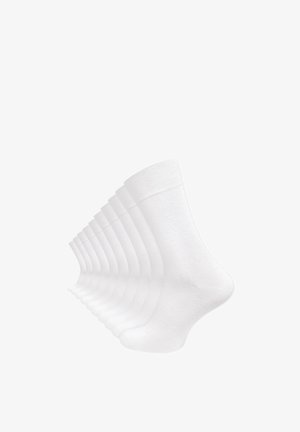 Chaussettes en coton blanc de type crew affichées dans un motif répétitif. Texture lisse, large élastique à la cheville, et un design simple sans motifs ni accents.