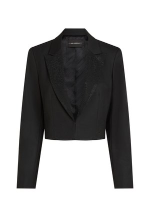 Black cropped blazer made of smooth fabric with a satin finish. Features a shiny black sequined lapel and a single closure in the front.
