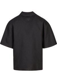 Black short-sleeve shirt with a relaxed fit, made of lightweight fabric. Features a classic collar and a clean, minimalist design.