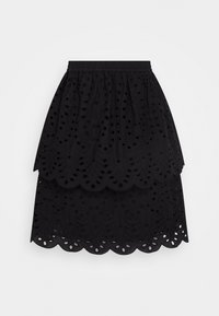 Jupe noire à volants avec des motifs floraux brodés et des découpes. Taille élastique, longueur genou, fabriquée en tissu léger.