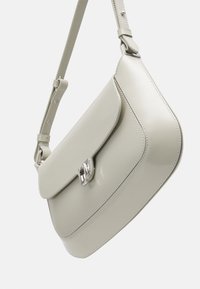 Coccinelle Kabelka - light grey