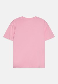 Short-sleeve, crew neck t-shirt in solid light pink fabric. Smooth texture with stitched hems and relaxed fit. Simple and minimalistic design.