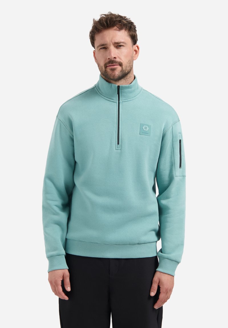 Licht turquoise sweatshirt met rits, gemaakt van zachte stof, met een logo patch op de borst en een zijzak met rits, voorzien van ribgebreide manchetten en onderkant.
