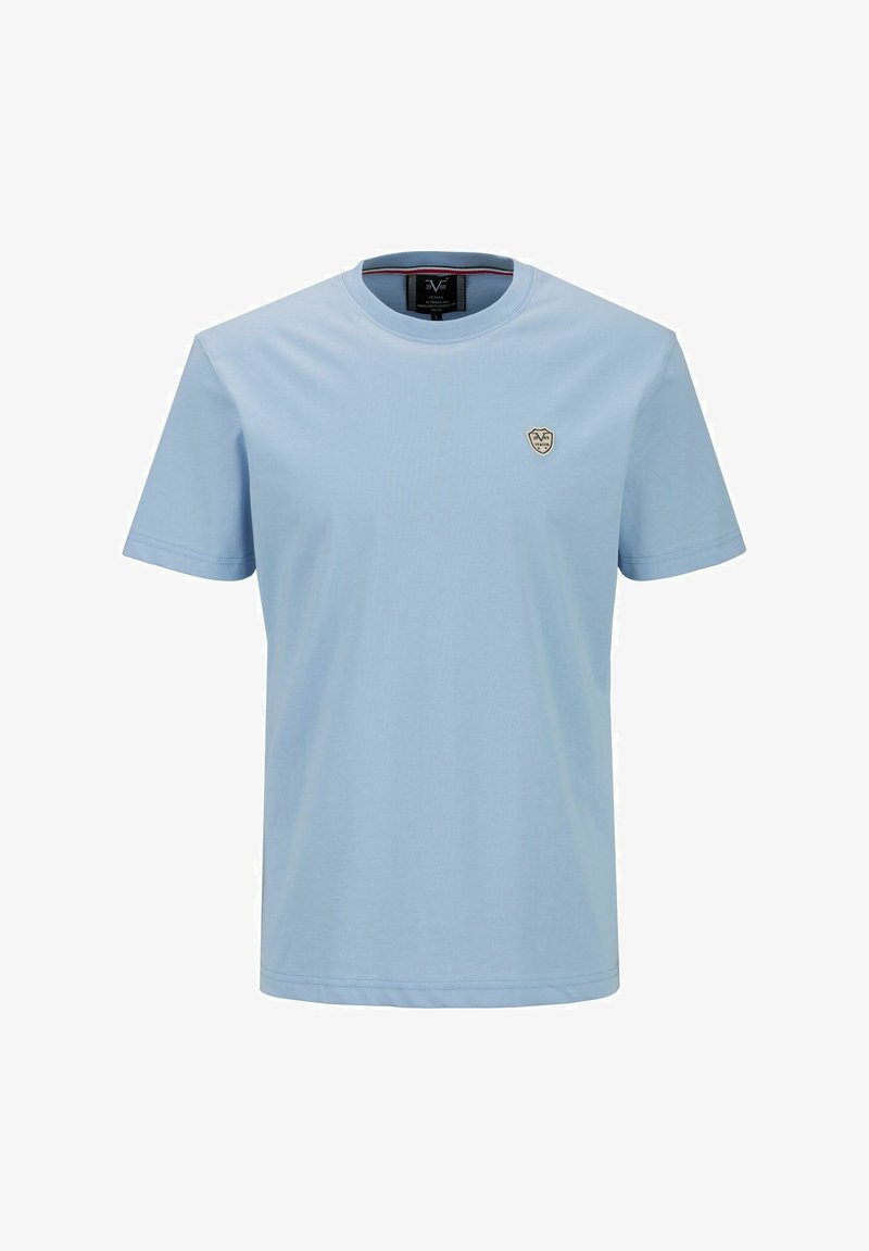 Hellblaues Kurzarm-T-Shirt aus Baumwolle. Mit einem Rundhals und einem kleinen gestickten Abzeichen auf der linken Brust. Glatte Textur.