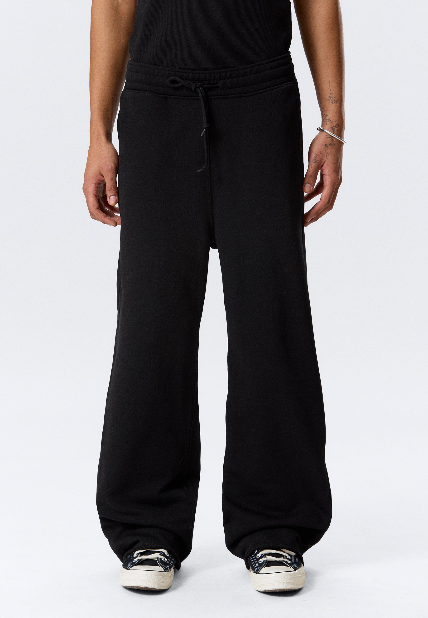 Weekday ASTRO LOOSE UNISEX - Tracksuit bottoms - black - Zalando