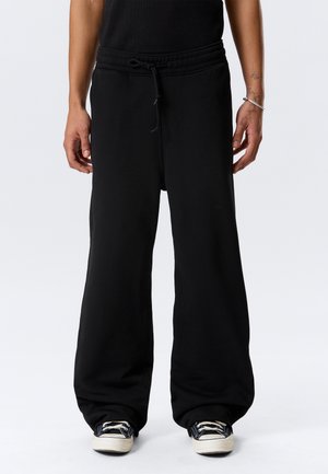 Weekday ASTRO LOOSE UNISEX - Træningsbukser - black