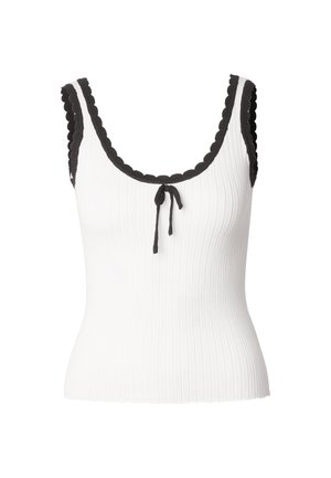 Wit geribd mouwloos topje met zwarte geschulpte afwerking aan de halslijn en armsgaten, voorzien van een klein zwart strikje aan de voorkant in het midden.