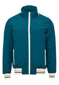 Teal polyamidjacka med hög krage, vit dragkedja, elastiska ärmar och randig ribbad nederkant. Har logotyp på bröstet och sidofickor.