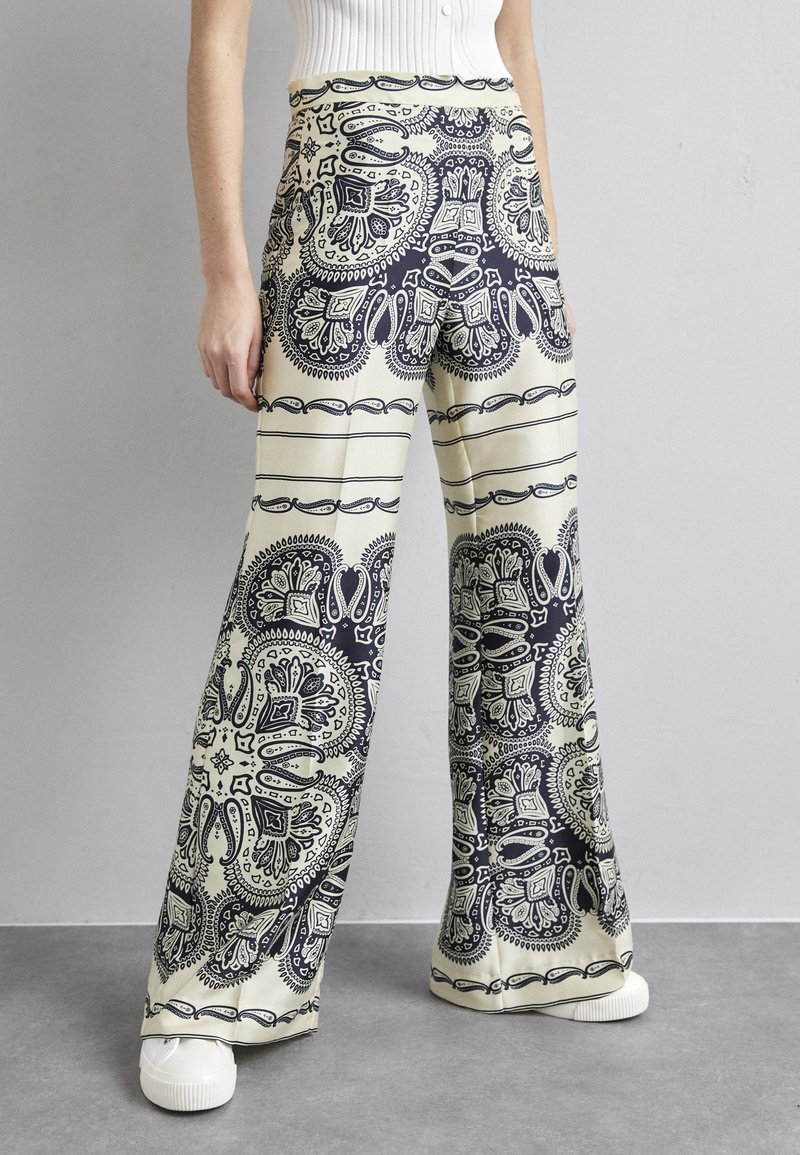 Pantalon 7/8 imprimé grec à revers - Beige