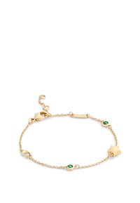 Gold chain bracelet featuring star and crescent moon charms, accented with green stones, and adjustable clasp for sizing.