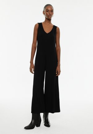 System Action MONOS - Combinaison - black