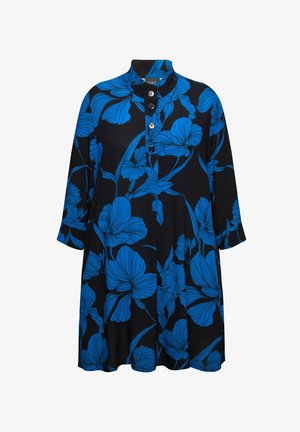 Zwarte jurk met blauw bloemenpatroon, knoopsluiting bij de nek en driekwartmouwen. Gemaakt van een zachte stof met een losse pasvorm.