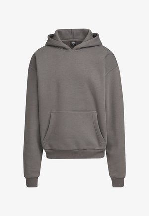 Hallhalli hallide särk, millel on ees tasku ja soonikkoes varrukad. Valmistatud pehmest materjalist, vabalt istuv ja õmblusteta õlavarre disainiga.