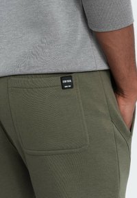 Ombre Trainingsbroek - olive