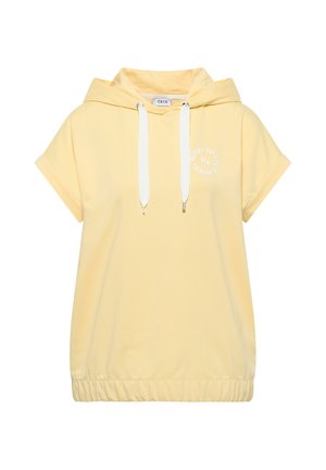 Lysegul hættetrøje med korte ærmer med hvide snore, elastisk kant og lille cirkulær hvid tekst på venstre bryst.