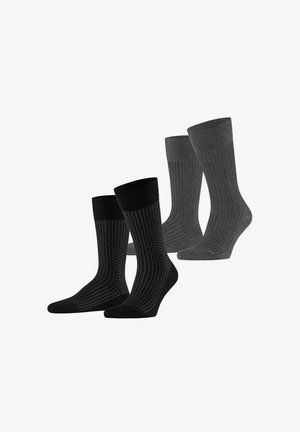 Four pairs of socks: two black with cubic grid texture, two gray with parallel ribbing; all are mid-calf length, made of soft, stretchy fabric.