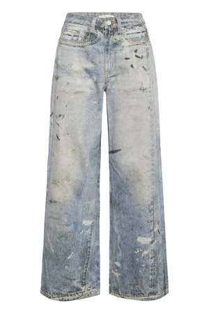 Φαρδιά τζιν παντελόνια σε ανοιχτό μπλε χρώμα με φθαρμένες λεπτομέρειες, διαθέτουν ψηλή μέση, πέντε τσέπες και εμφανείς ραφές.