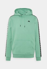 Hoodie vert menthe avec une pochette kangourou, un capuchon ajustable avec cordon, et des bandes latérales noires arborant un motif de logo répétitif.